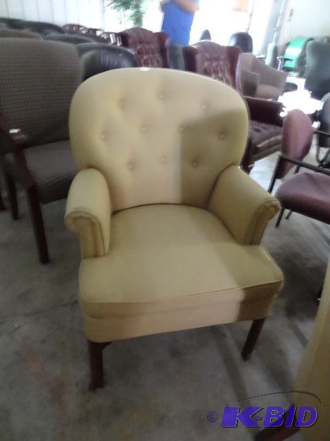 Wood framed cushioned chair. Arm will need a ...