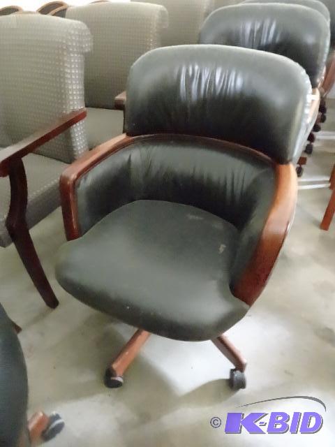 2 matching office chairs on wheels...