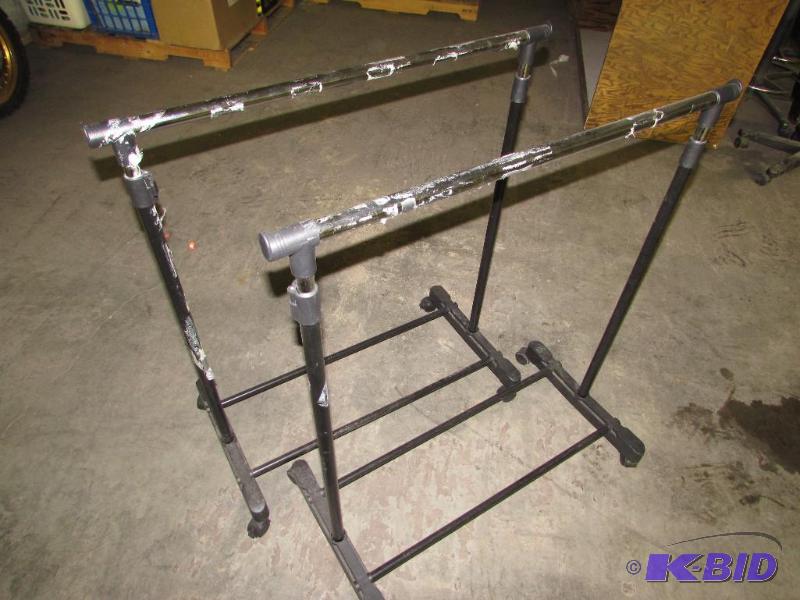 2 adjustable laundry racks...