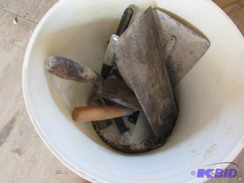 bucket of masonry tools...