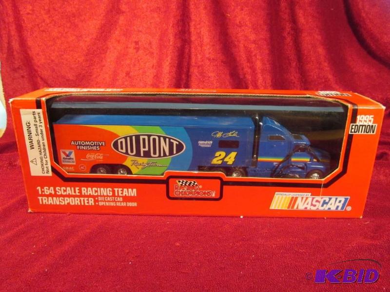 lot 17 image: 1995 #24 Jeff Gordon Dupont 164 Transporter by Racing Champions
