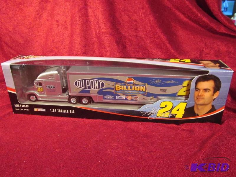 lot 22 image: 2005 Jeff Gordon #24 Dupont Billion Dollar 164 Transporter Action.