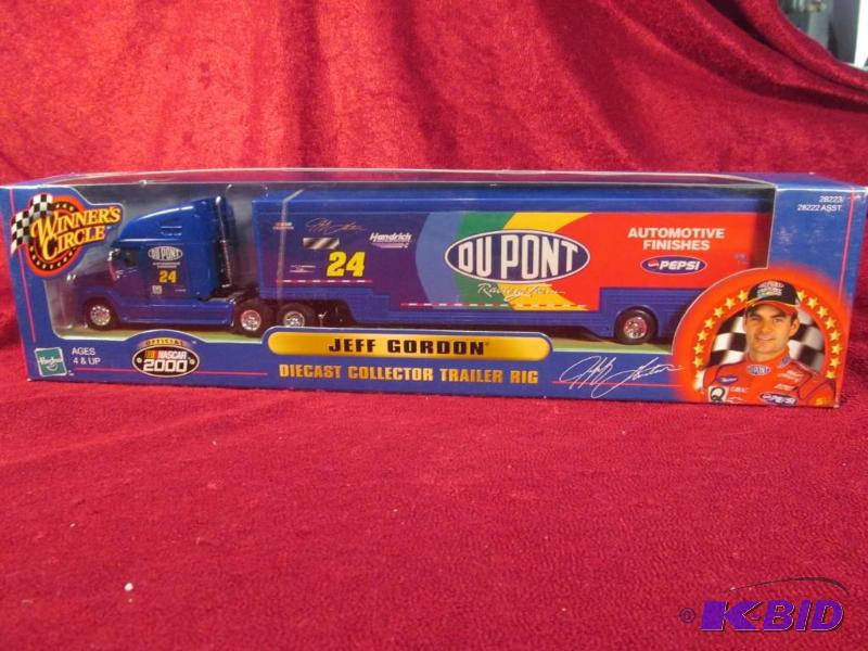 lot 24 image: 1999 Jeff Gordon #24 Dupont 164 Transporter Hasboro.