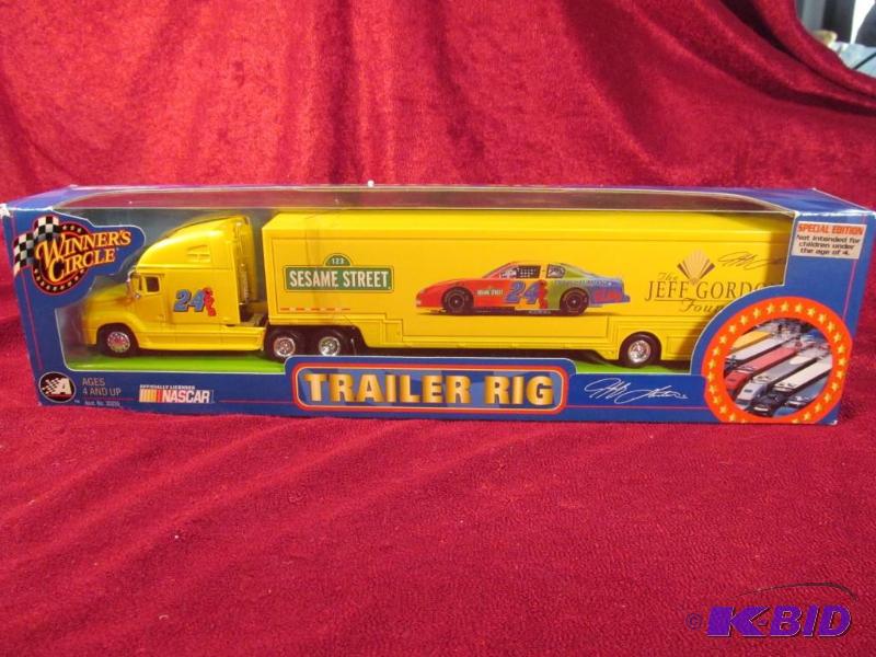 lot 28 image: 2003 Jeff Gordon #24 Dupont Sesame Street 164 Transporter Action.