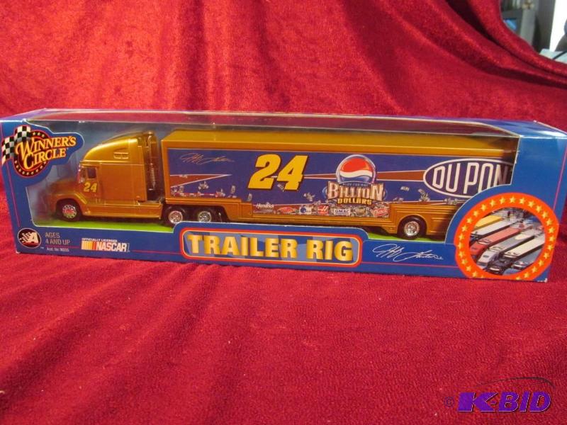 lot 29 image: 2003 Jeff Gordon #24 Dupont Billion Dollar 164 Transporter Action.