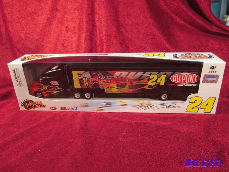 lot 31 image: 2009 Jeff Gordon #24 Dupont Daytona 500 164 Transporter Motorsports Authentics.