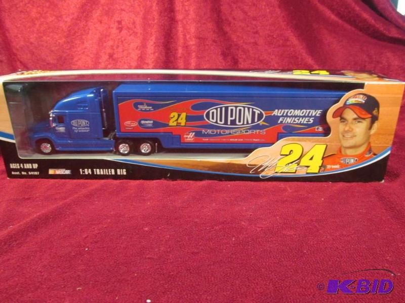 lot 33 image: 2004 Jeff Gordon #24 Dupont 164 Transporter Action