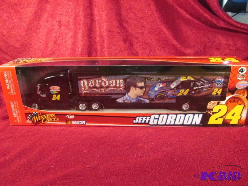 lot 34 image: 2008 Jeff Gordon #24 Dupont 164 Transporter Action