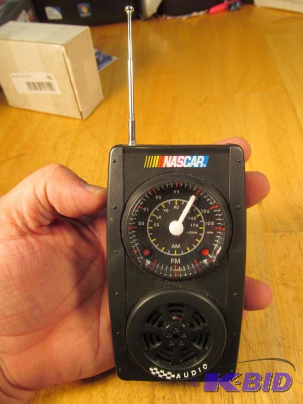 lot 42 image: NASCAR Battery Operated Track Radio in excellent condition. 2 AA battery not included.