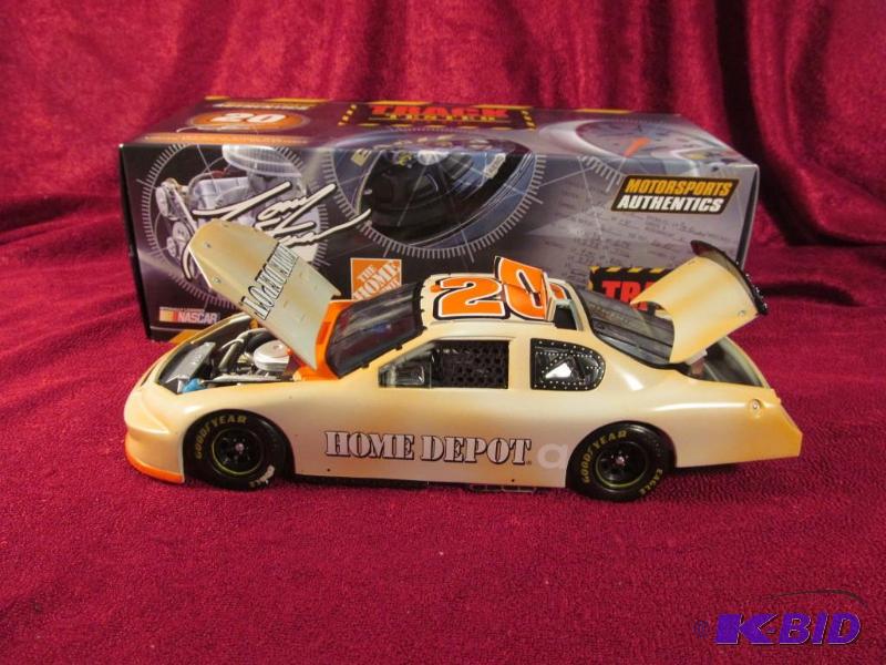 lot 5 image: 2006 #20 Tony Stewart Home Depot  Track Tested 1 of 3,588 NASCAR Monte Carlo Action Collectables 124 Scale.