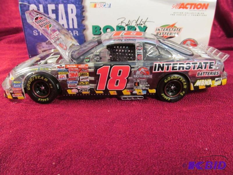 lot 6 image: 2001 #18 Bobby Lebonte CLEAR CAR Interstate Batteries Jurassic Park III 1 of 6,000 Action Collectables 124 Scale NASCAR Grand Prix