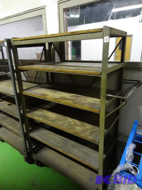 lot 10 image: 6 tier cart on wheels. 39 x 21 x 62...