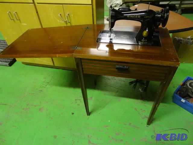 lot 125 image: Singer Electric Sewing Machine in Cabinet. Se...