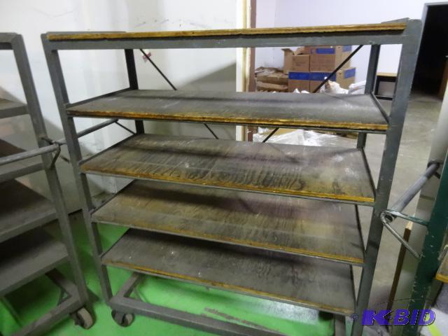 lot 14 image: 6 tier cart on wheels. 51 x 21 x 62...