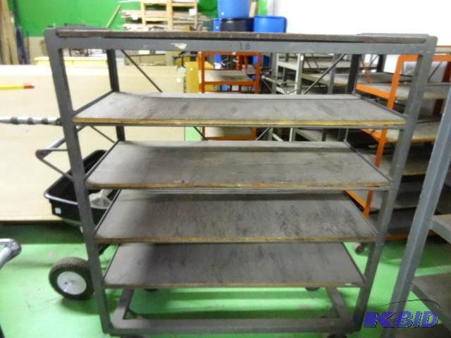 lot 15 image: 6 tier cart on wheels. 51 x 21 x 62...