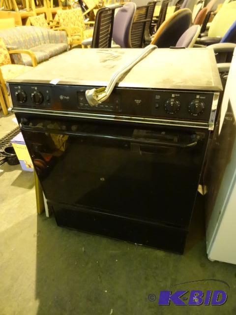 lot 193 image: GE profile electric flat top stove and oven. ...