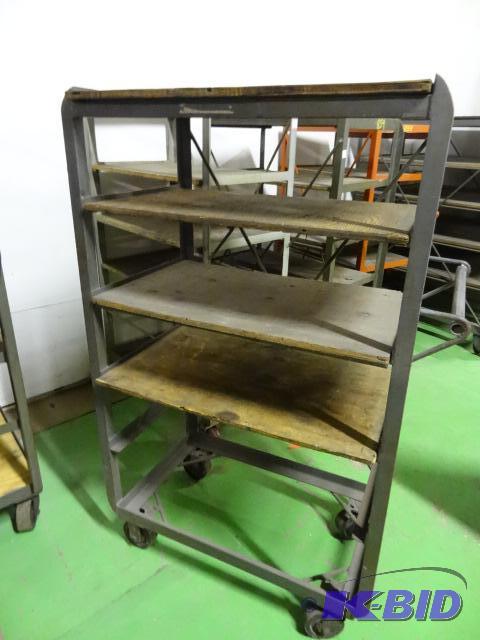 lot 20 image: 6 tier cart on wheels. 34 x 21 x 34...