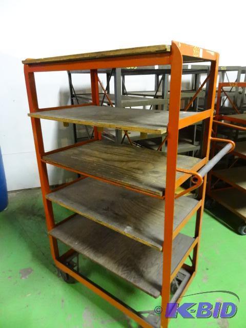 lot 23 image: 6 tier cart on wheels. 34 x 21 x 61...