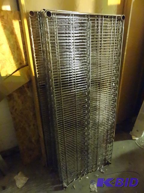 lot 248 image: 2 wire shelving units. 7 shelves. 8 poles. No...