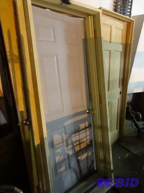 lot 254 image: Lots of misc doors and trim. Some are new. In...