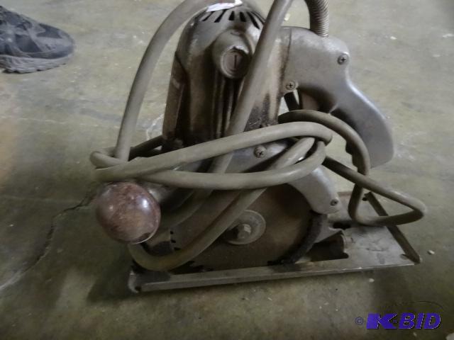 lot 319 image: Cummins model 600 6" portable saw...