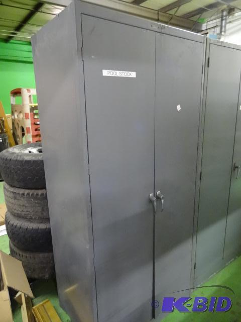 lot 33 image: 2 door metal cabinet. 4 shelves. 36 x 24 x 78...