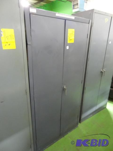 lot 35 image: 2 door metal cabinet. No shelves. 36 x 18 x 7...