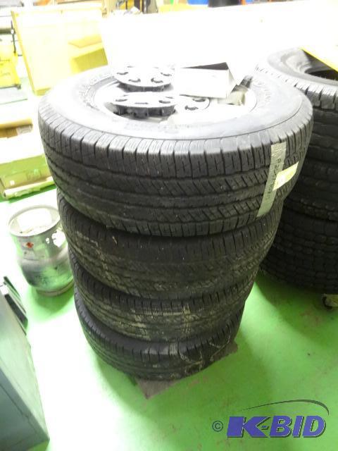 lot 37 image: 4 tires with aluminum rims. 6 hole rims for C...