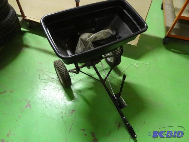 lot 39 image: Pull behind broadcast spreader. With cover...