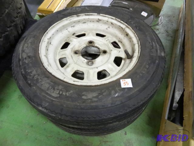 lot 55 image: 2 trailer tires with 4 hole rims. 4.80-12...