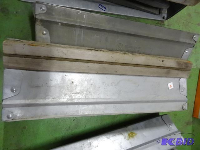 lot 68 image: 2 fold up metal saw horses...