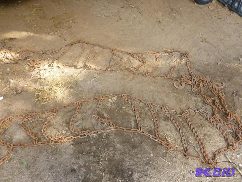 lot 10 image: A set of Ford 8N tractor tire chains....