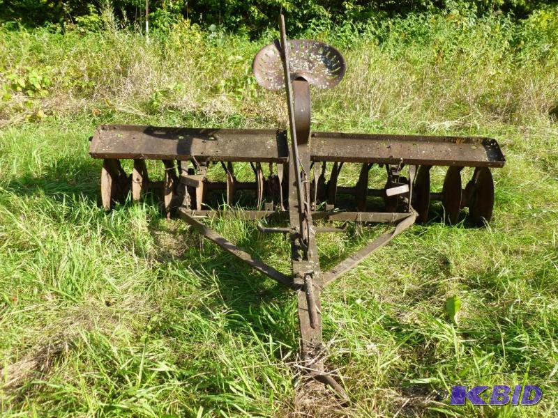 lot 21 image: Vintage horse drawn field disc that measures ...