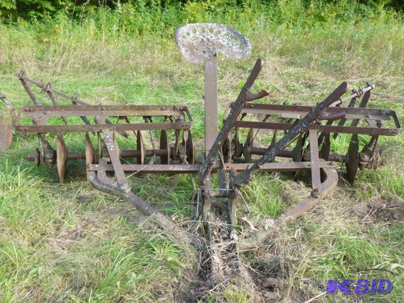 lot 23 image: Vintage horse drawn field disc that measures ...