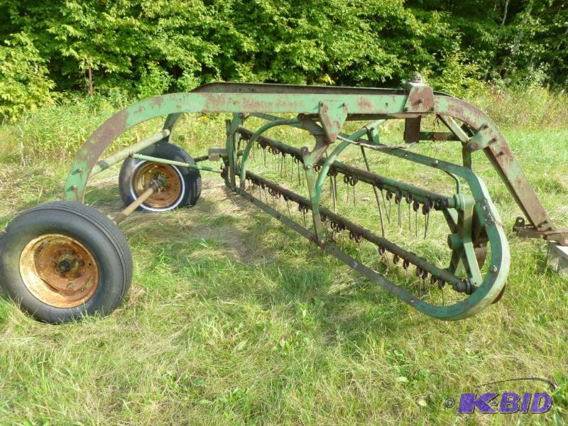 lot 26 image: Large John Deere ground driven hay rake....