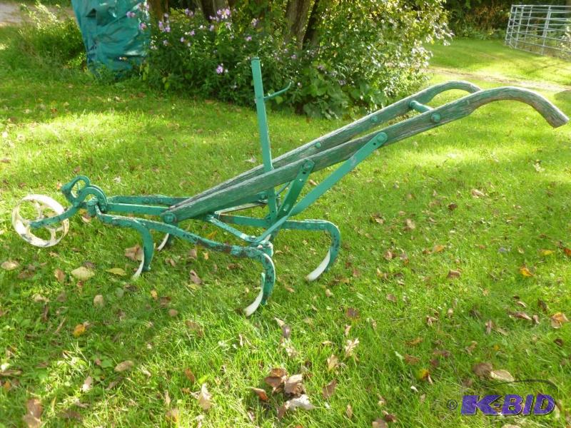 lot 31 image: Large antique walk behind horse drawn cultiva...