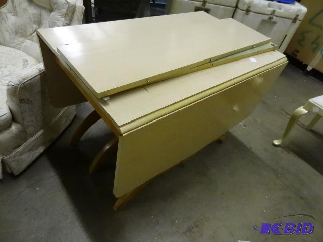 lot 57 image: Vintage compact kitchen table. Drop down side...