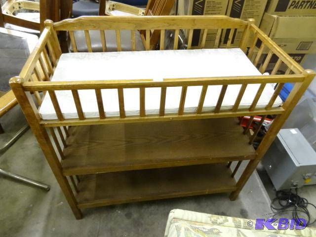 lot 81 image: Wood baby changing station. 360 degree swivel...