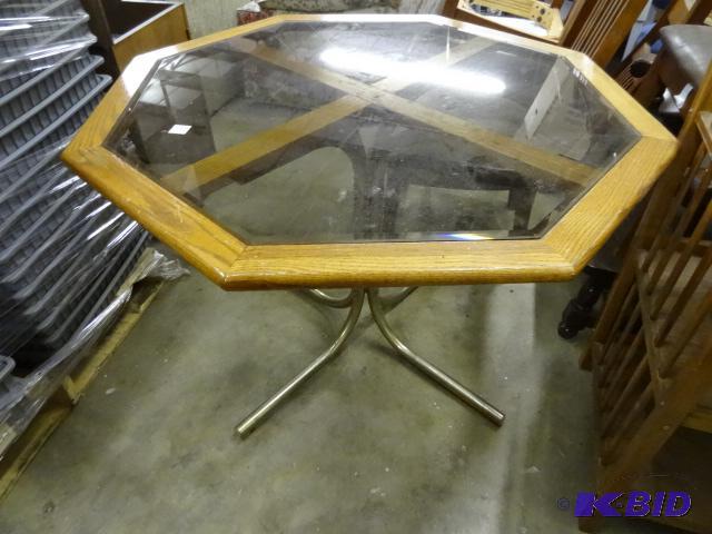 lot 82 image: Glass top kitchen tabel. 42". Metal fram...