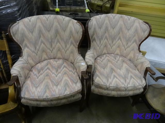 lot 87 image: 2 matching cushioned living room chairs...