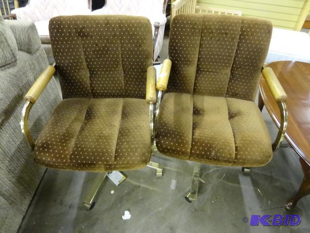 lot 93 image: 2 metal framed chairs on wheels...