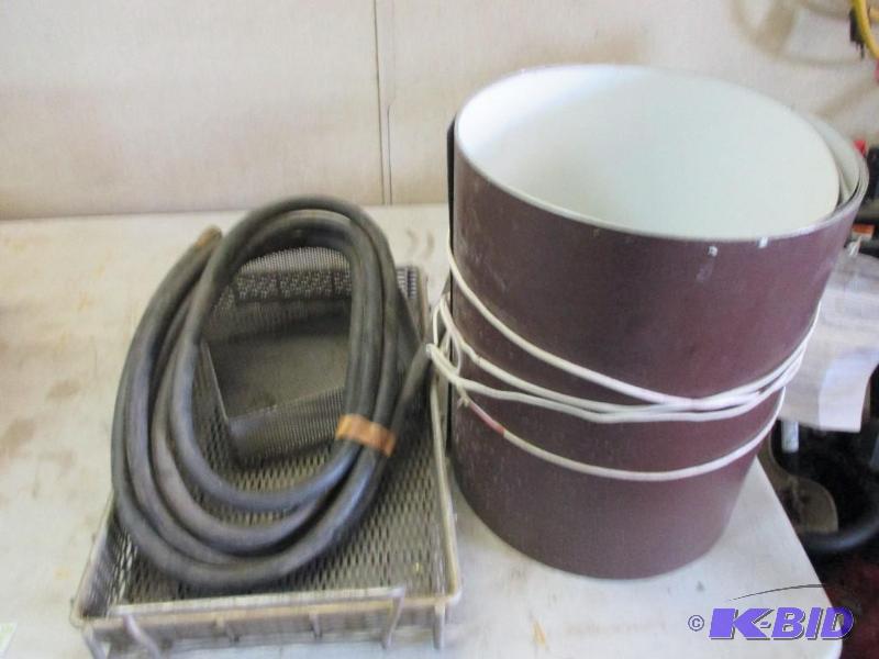 Roll of flashing, screen baskets, gas hose...