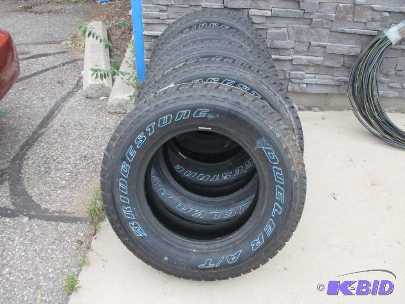 5 new Bridgestone Dueler HT 23575R17 tires...