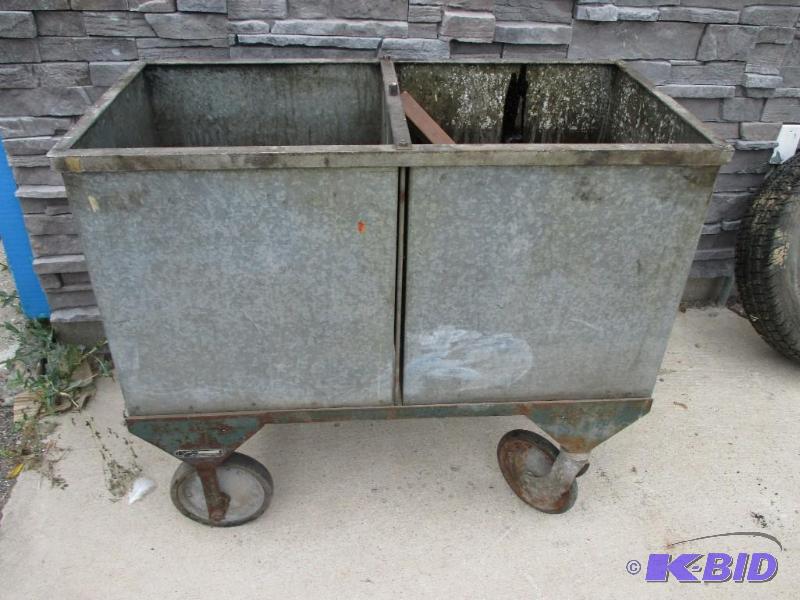 Dual comparment tank cart with drain valves...