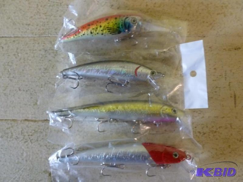 lot 38 image: Lot of four large fishing crank baits, all fo...