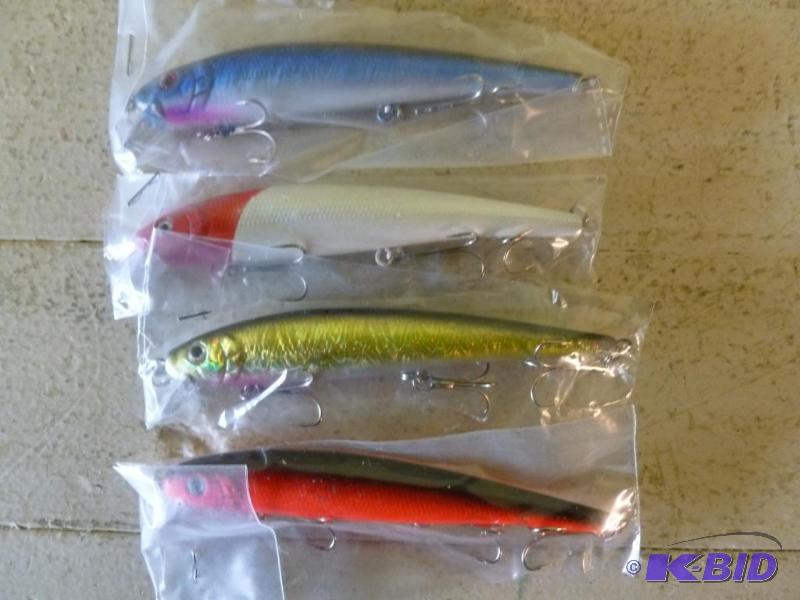 lot 39 image: Lot of four large fishing crank baits, all fo...