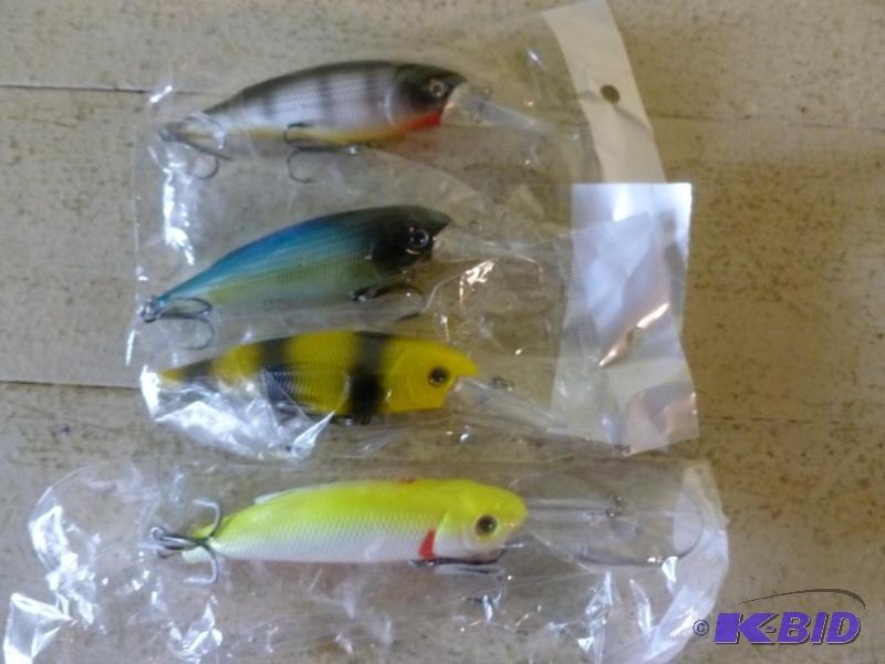 lot 40 image: Lot of four large fishing crank baits, all fo...