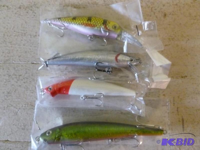 lot 41 image: Lot of four large fishing crank baits, all fo...