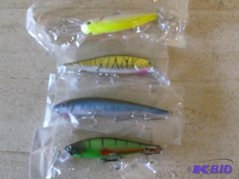 lot 43 image: Lot of four large fishing crank baits, all fo...