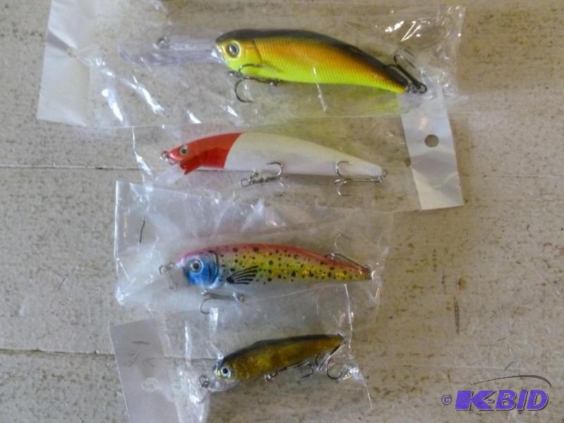 lot 46 image: Lot of four large fishing crank baits, all fo...
